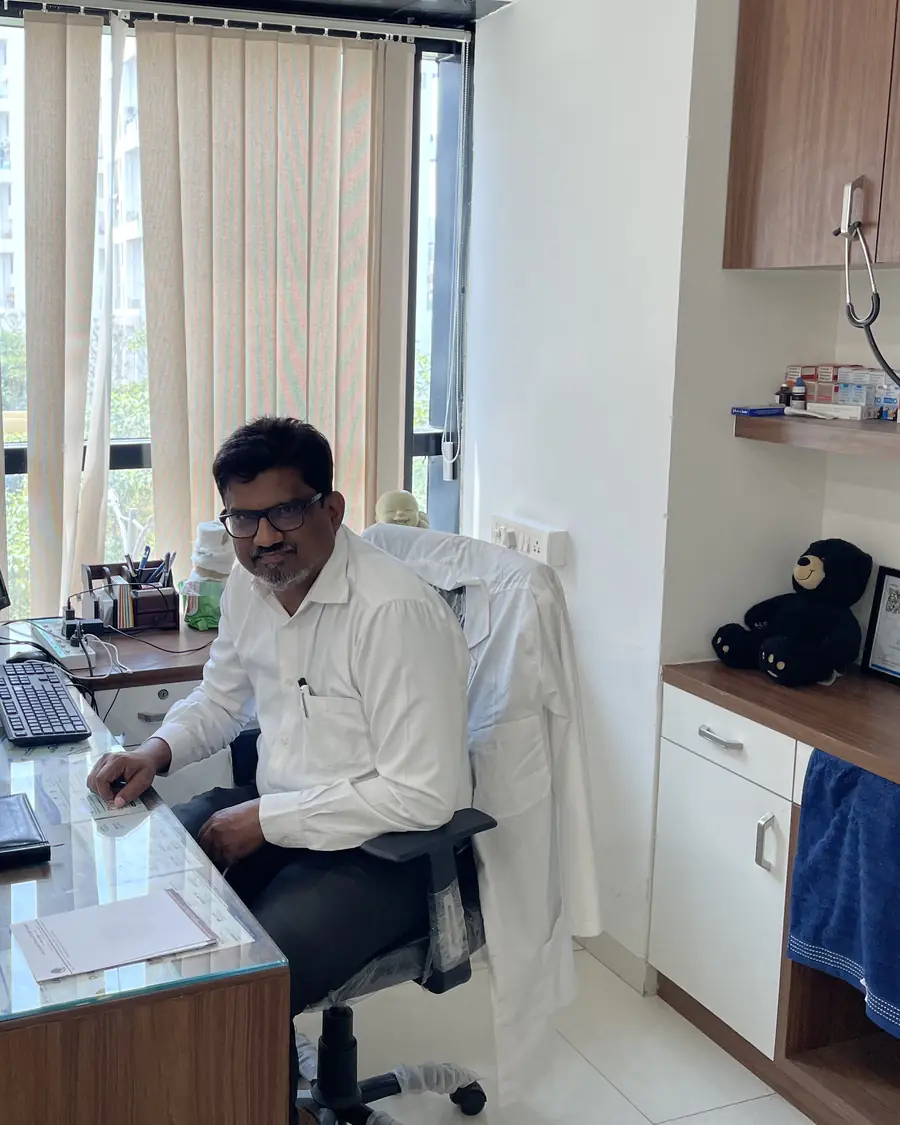Dr. Sudhir Halikar, ENT specialist, at his desk in Hallmark Speciality ENT Clinic