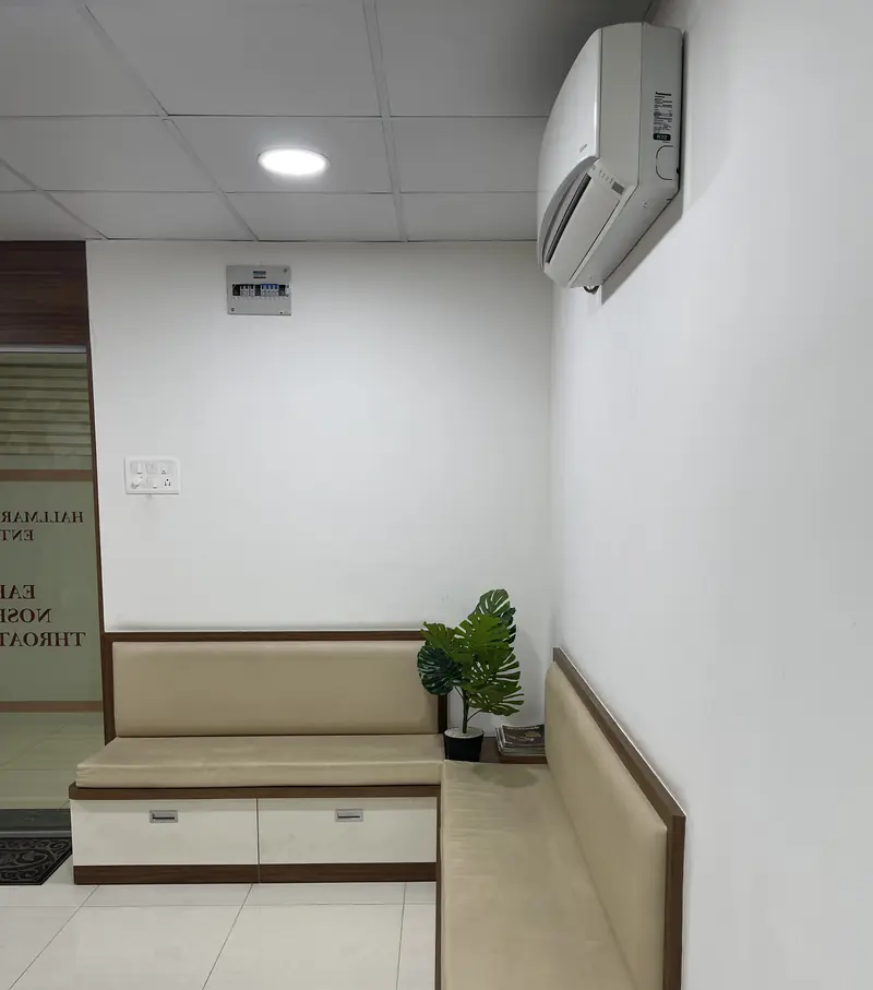 Clean, air-conditioned waiting area with cushioned seating